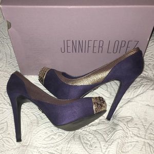 Navy blue and gold Jennifer Lopez heels.